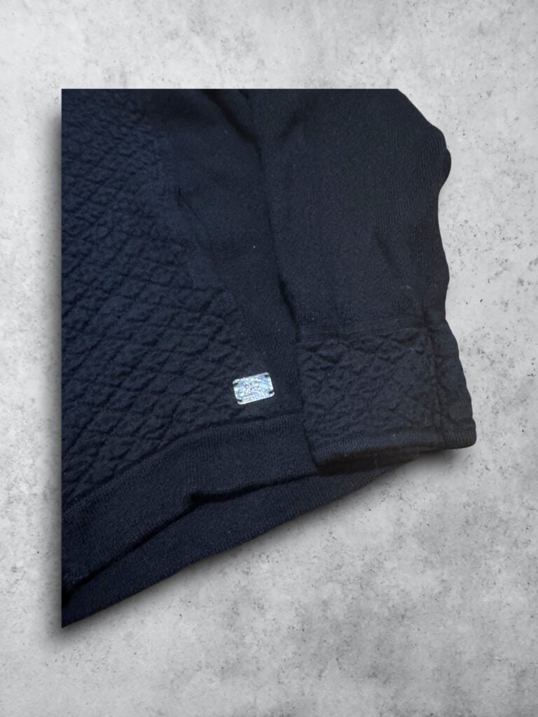 Jersey Burberry negro con cremallera, estilo vintage y de alta calidad.