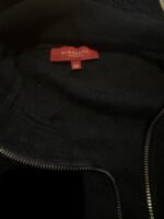 Chaqueta Burberry negra de cuero con cremallera, estilo vintage y talla 46. Perfecta para un look cl.