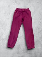 Pantalón de chándal vintage en color burdeos, ideal para estilo deportivo y casual.